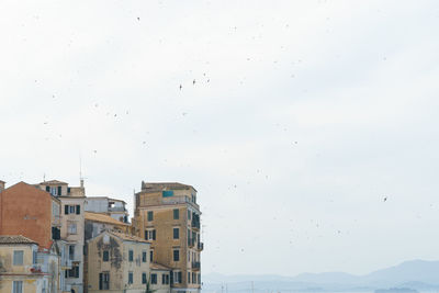 Low angle view of buildings against sky