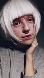 Close-up portrait of a woman with eyes closed