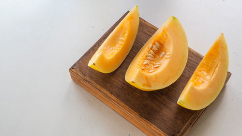 High angle view of orange fruits on table