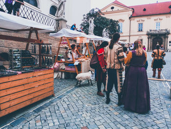 People on street in city