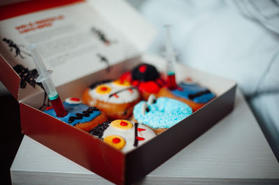 High angle view of figurines on table