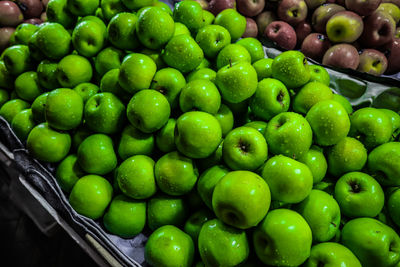 High angle view of green fruits for sale in market