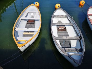 High angle view of boats moored at harbor