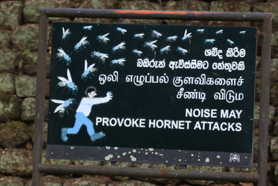 Close-up of information sign