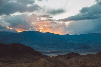 View of mountain range against cloudy sky