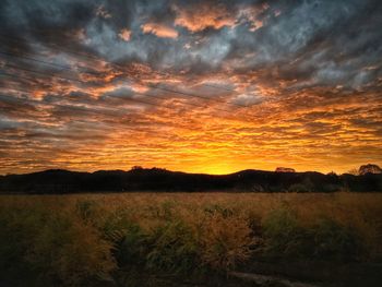 Scenic view of silhouette landscape against sky during sunset