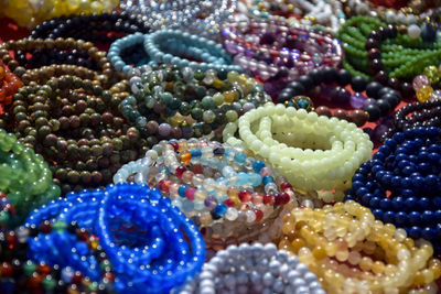 Women's jewelry, small business. handmade bracelets on the counter of a street market