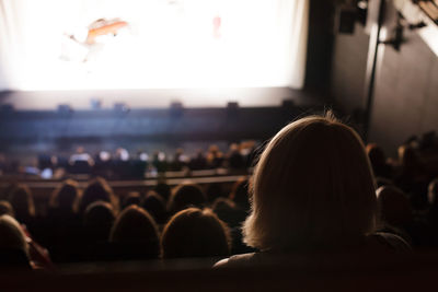 Rear view of people sitting in theater