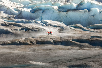 People on snow covered mountain