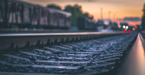 Close-up of cars in row at sunset