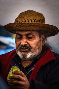 Portrait of man wearing hat