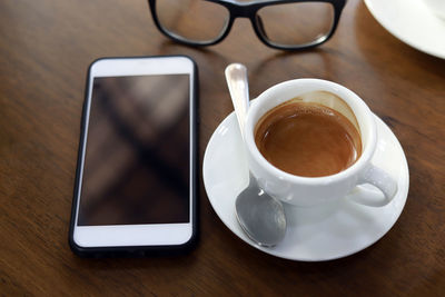 Close-up of coffee cup on table