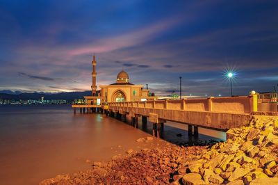 View of temple against sky during sunset