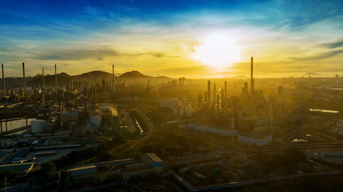 Cityscape against sky during sunset