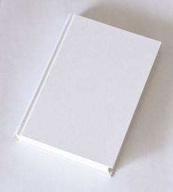 High angle view of open book on table