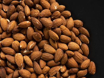 Full frame shot of coffee beans against black background