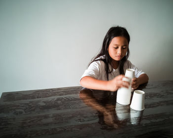 Girl playing on table