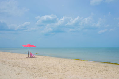 Scenic view of beach against sky