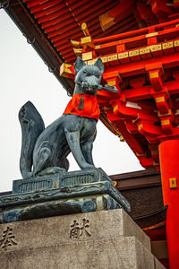 Low angle view of statue of historic building