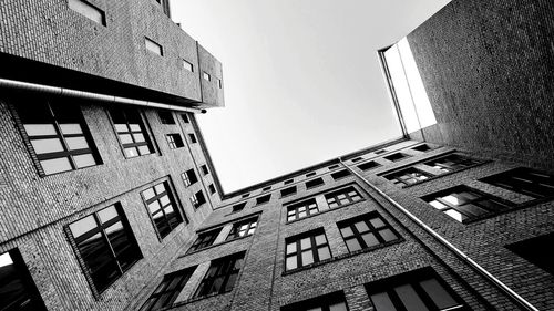 Low angle view of buildings against clear sky