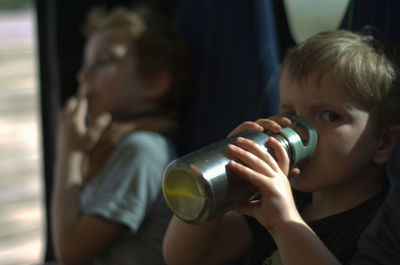 Young boy  drinking water