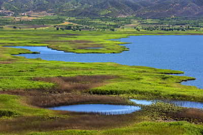 Scenic view of lake and landscape