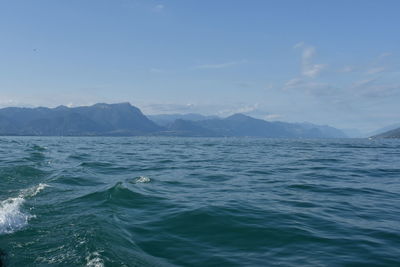 Scenic view of sea against blue sky