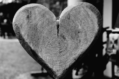 Close-up of heart shape made on wood