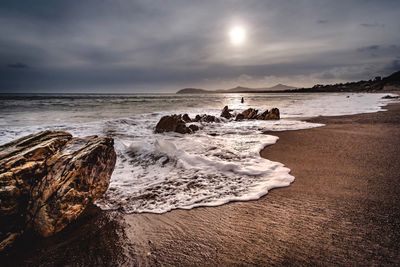 Scenic view of sea against sky during sunset