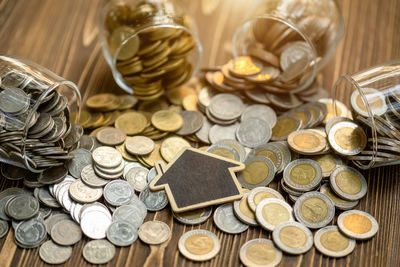 High angle view of coins on table