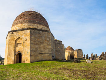 Low angle view of historical buildings against sky