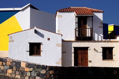 Residential building against blue sky