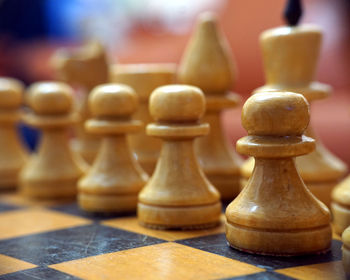 Close-up of chess pieces on board