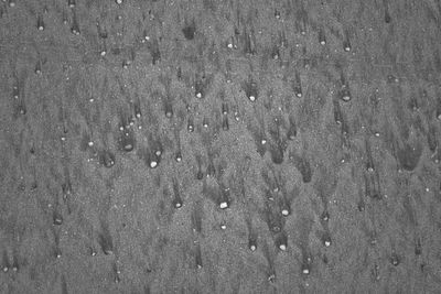 Full frame shot of wet sand