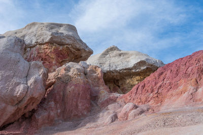 Rock formations on mountain against sky