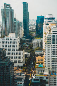 High angle view of buildings in city against sky