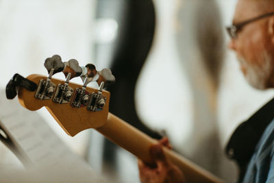 Musician playing bass guitar