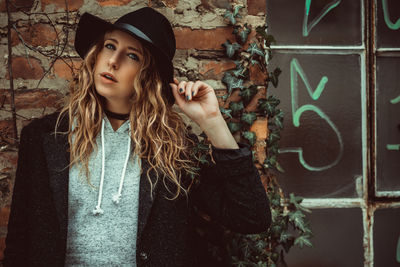 Young woman standing outdoors