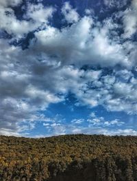 Low angle view of land against sky