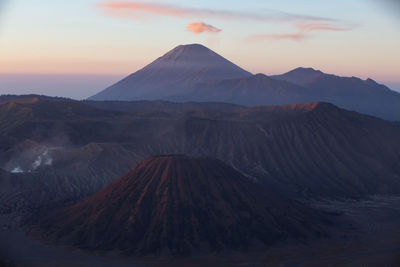 View of volcanic mountain during sunset