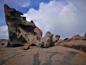Rock formation on land against sky