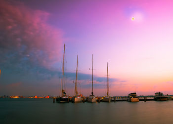 Scenic view of sea against sky at night