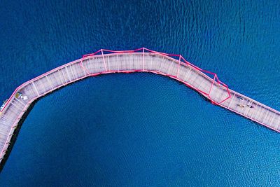 High angle view of swimming pool against blue sky