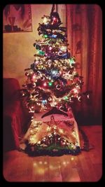 Close-up of illuminated christmas tree