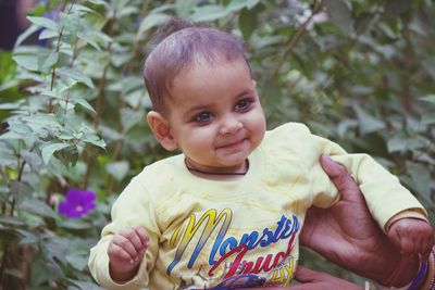 Portrait of cute boy smiling