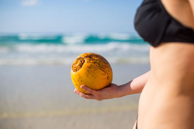 Cropped image of woman holding hands