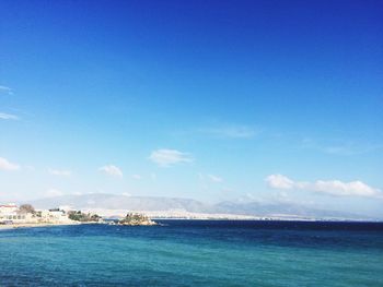 Scenic view of calm sea against cloudy sky