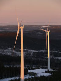 Wind turbines on countryside landscape