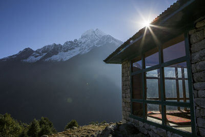 Sunrise above a peak near namche bazaar on the trail to everest.