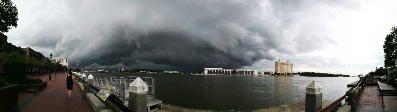 PANORAMIC VIEW OF SEA AGAINST STORM CLOUDS